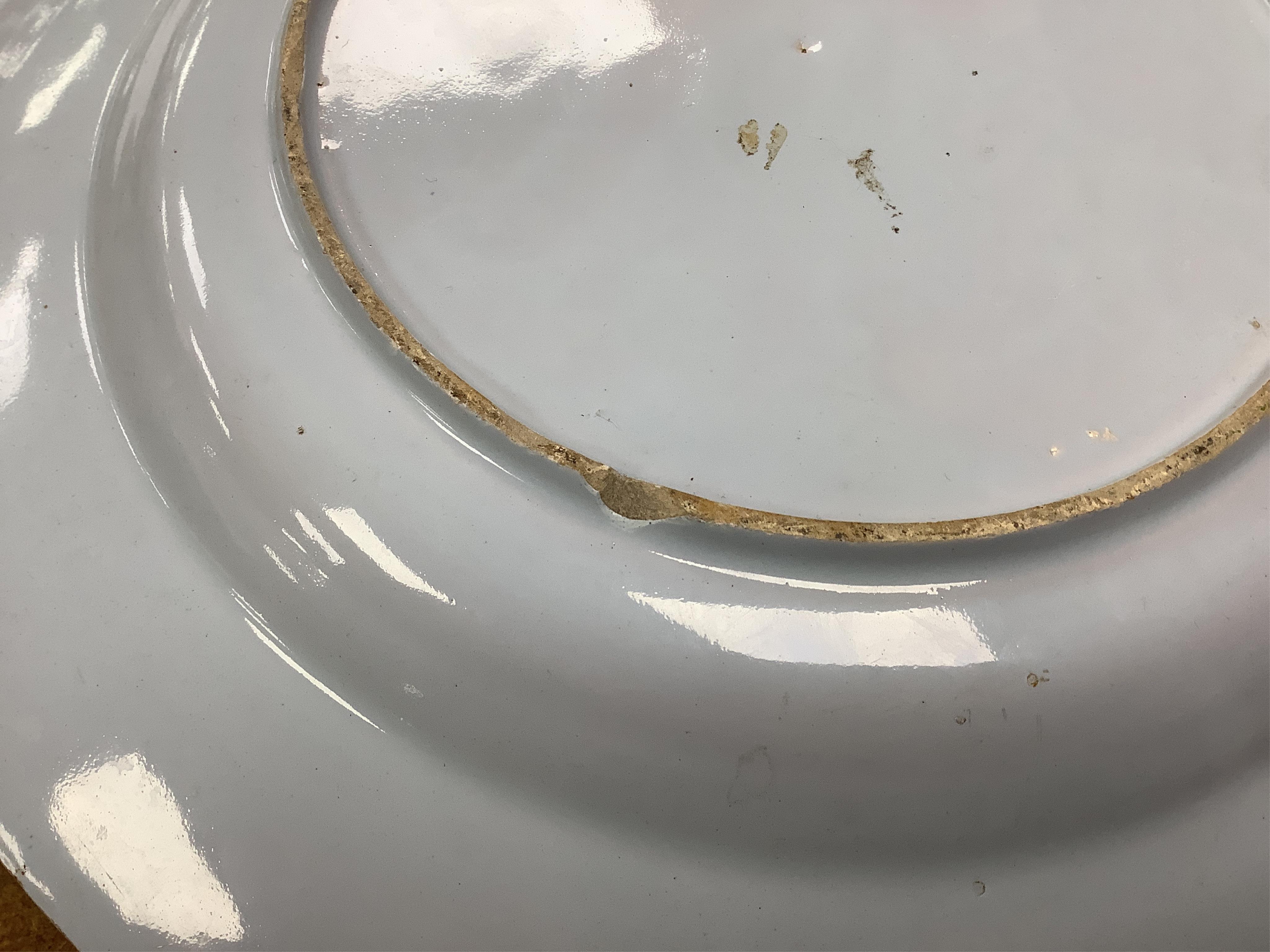 An 18th century English delftware plate, 34cm